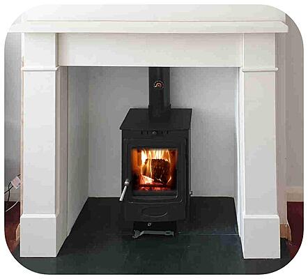 white surround, rendered chamber and granite hearth