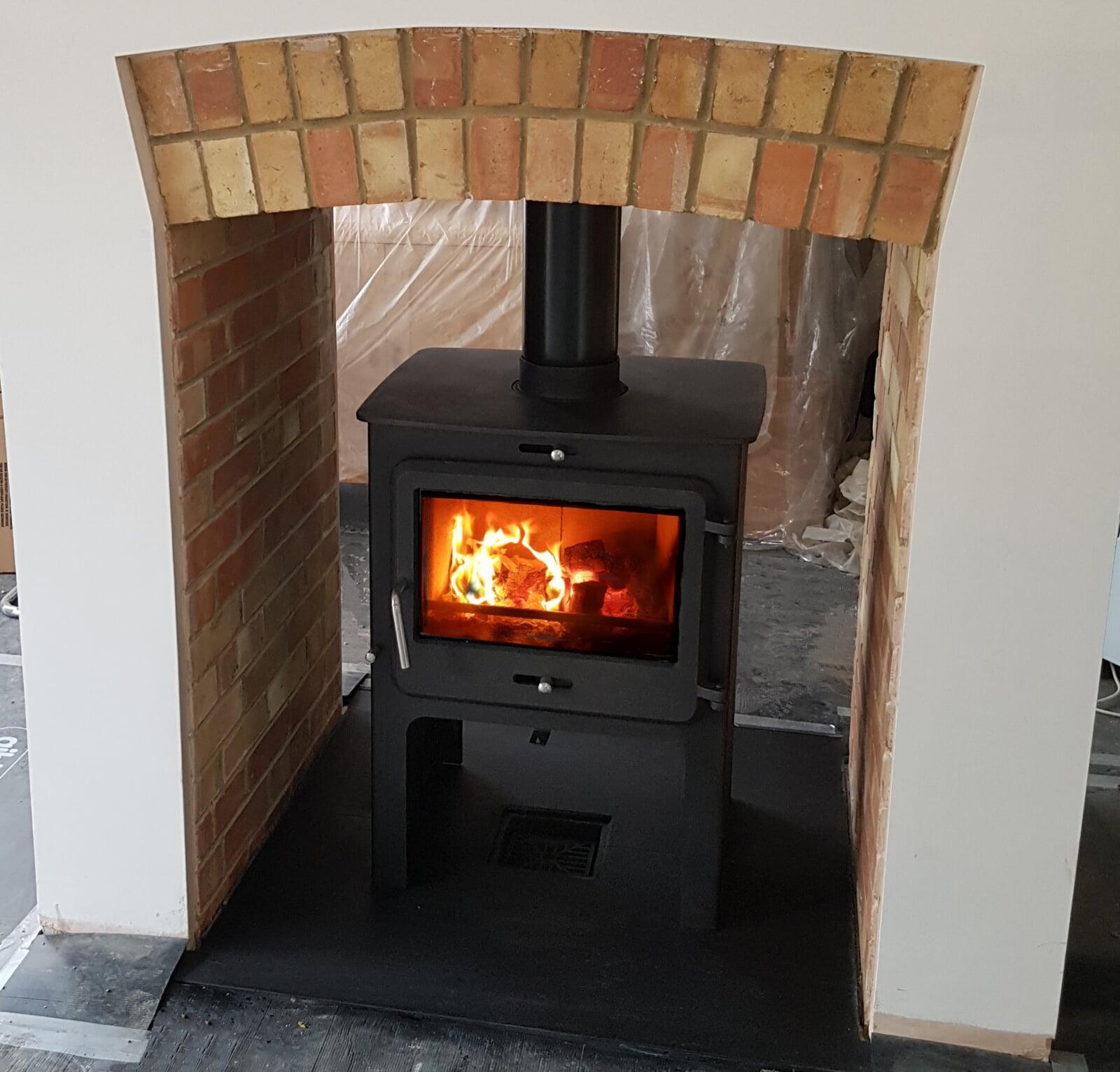 Multifuel Fuel Freestanding Stove with brick chamber and granite hearth