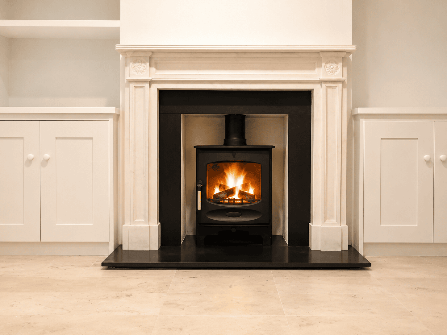 Granite hearth and slips with white surround